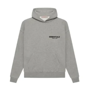 sudadera con capucha Essentials Fear of God color avena gris, confeccionada en algodón premium con corte oversize y acabado de alta calidad.