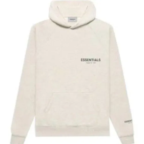 Gris humo Sudadera con capucha y cremallera Fear of God Essentials Gris humo Sudadera con capucha y cremallera Fear of God Essentials frontal, bolsillo y diseño cómodo y minimalista