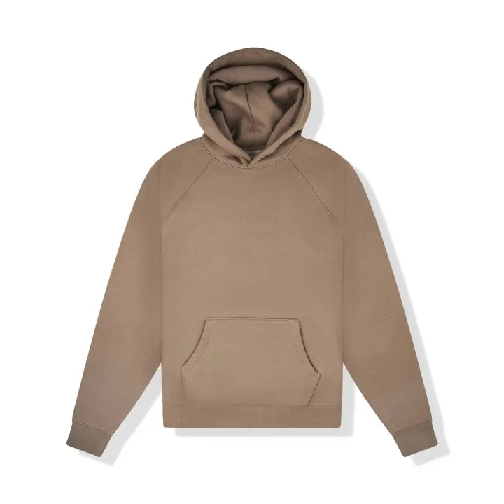 Sudadera con capucha Essentials Fear of God Harvest Vista frontal de la sudadera con capucha Essentials Fear of God Harvest en color Harvest, confeccionada con algodón premium y corte oversize.