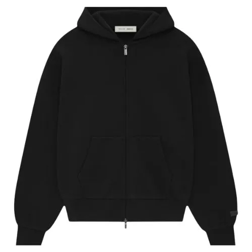 Sudadera negra con cremallera Essentials Sudadera negra con cremallera Essentials de algodón premium, cierre completo, capucha ajustable y corte relajado para hombre y mujer.